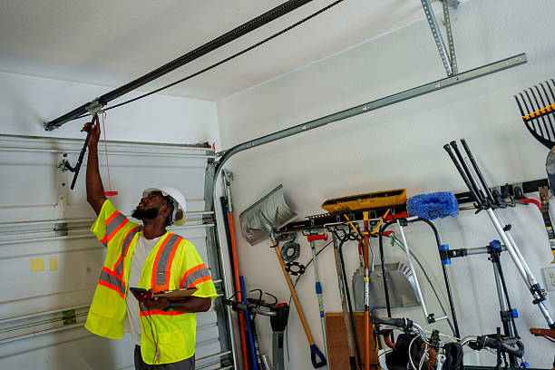 Professional Garage Door Roller Replacement technician working in Lake Mills, WI